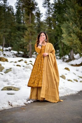 Lucaya Vol 15 by Pure Maslin showcases a stunning flared kurti, palazzo, and dupatta set that exudes elegance and style. This ensemble is crafted from readymade suit catalogs