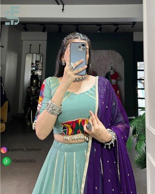 Navratri Lehenga Choli 1655 Aqua Blue Colour Designer Pure Rayon Lehenga Choli Set Gotta Patti Lace  Mirror Gamthi  Cowrie Accents And Embroidered  lehenga choli