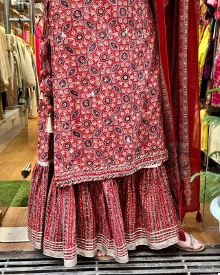 The three piece sharara set features an Embroidery Neck Design kurta  a flared sharara and intricately embroidered  Semi dupatta kurtis